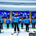 스키 강사의 국제 대회 참여 사례 - A detailed indoor ski training facility in Thailand, featuring Thai ski instructors guiding young ad...